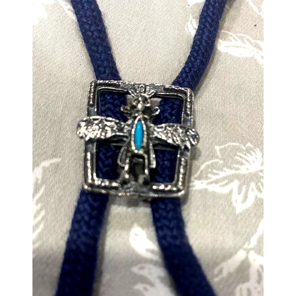 Silver & Turquoise Kachina Man Bolo Tie With Navy Blue Braided Cord And Metal Ti